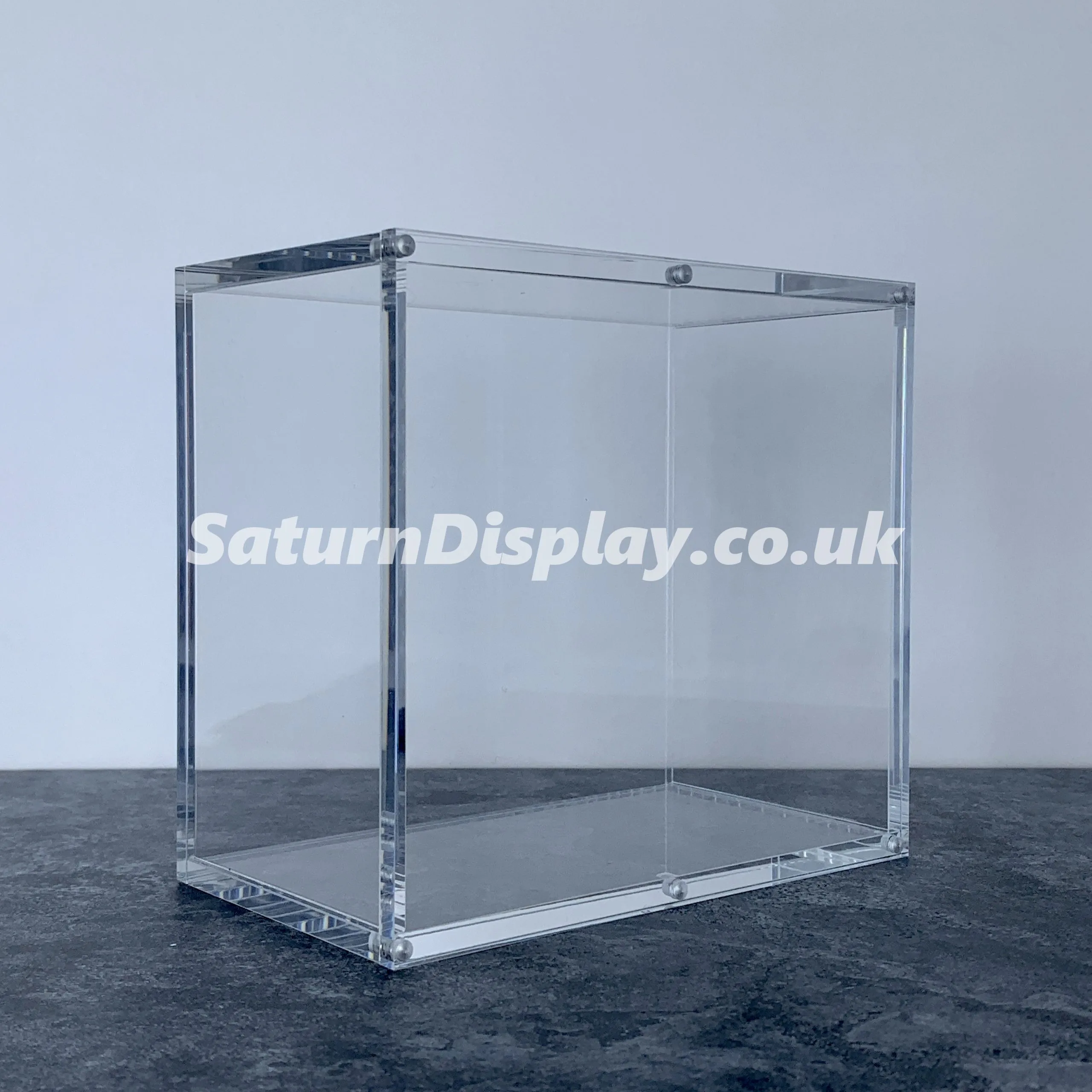 High quality Saturn Display Acrylic Booster Box Display Case for Popular Trading Card Games TCG. Complete with a magnetic closing lid.